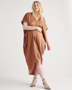 An elevated upgrade to basic maternity wear. This easy-to-wear silhouette is perfect for a date night or destination wedding. With a removable belt, there are multiple ways to wear it. This super flattering fit is made from 100% mulberry silk, in a satin finish. The best part…our silk is washable. Easy to style and easy to wash for low-maintenance luxe. Plus, silk fiber contains 18 kinds of amino acids that make it amazing for skin nourishment, hypo-allergenic, and naturally thermoregulating to Elegant Nursing Friendly V-neck Dress, Chic Maternity Dress Nursing Friendly, Chic Nursing Friendly Maternity Dress, Elegant V-neck Maternity Dress Nursing Friendly, Chic Maxi Maternity Dress, Elegant V-neck Bump-friendly Dress, Elegant V-neck Bump Friendly Dresses, Elegant Summer Maternity Midi Dress, Elegant V-neck Maternity Dress For Brunch