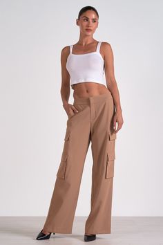 Merge sophistication with utility in Raja pants. These wide-legged cargo trousers with large pockets create a bold silhouette for the fashion-forward woman. Denim Dress Fall, Jumpsuit Coverup, Fall Bottoms, Hemant And Nandita, Cardigan Sweater Dress, Pants Large, Cargo Trousers, Sweater Set, Denim Jumpsuit