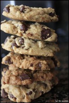 chocolate chip cookies stacked on top of each other