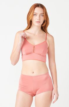 You can expect both comfort and support in our signature bralette --so comfortable, you can even sleep in it. Our brilliant, solid colors are made from a high grade, venezia fabric that acts as a second skin. Finally, a bra that really works without underwire! The straps adjust and are made of 1/2" elastic that won't dig into your shoulders after a long day. Ethically made in USA Venezia: 95 % Polyester / 5% lycra blend. Machine wash cold delicate, line dry. Mauve Color, Nude Color, Hug You, Coral Color, Second Skin, Beige Color, Body Types, High Grade, Polyester Spandex