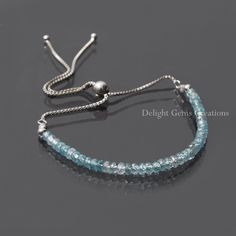 "PRODUCT DETAILS :  ITEM : BLUE ZIRCON BOLO CHAIN SILVER BRACELET ITEM CODE : DGC4852 STONE NAME : BLUE ZIRCON MATERIAL : 925 STERLING SILVER, GEMSTONE CHAIN STYLE : BOX CHAIN BEADS SHAPE : FACETED RONDELLE BEADS SIZE : 3-3.5 MM Approx. LENGTH : 10\" INCH ADJUSTABLE BRACELET ( 4 INCH FRONT STONES) WEIGHT : 25 Cts. Approx. CUSTOMIZATION : **AVAILABLE** PLEASE FEEL FREE TO CONTACT US IF YOU HAVE ANY QUERIES." Blue Resizable Round Bead Jewelry, Hand-strung Adjustable Sapphire Jewelry, Adjustable Hand-strung Sapphire Jewelry, Adjustable Sapphire Beaded Bracelets With Gemstones, Adjustable Sapphire Bracelets With Gemstone Beads, Adjustable Faceted Sapphire Bracelets, Adjustable Sapphire Bracelet With Gemstone Beads, Adjustable Faceted Sapphire Bracelet, Blue Adjustable Chain Bracelet