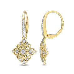 With romantic vintage-inspired details, these diamond lace drop earrings complement your sweet style. Crafted in warm 10K gold Each drop showcases intricate milgrain-detailed ribbons scrolling along an open-worked kite-shaped design. Diamonds dot the look and shimmer along the milgrain-bordered ear wire. These 1/5 ct. t.w. diamond earrings secure with lever backs. Wedding Yellow Gold Diamond Earrings With Filigree, Wedding Yellow Gold Filigree Diamond Earrings, Classic Filigree Diamond Drop Earrings, Classic Diamond Drop Earrings With Filigree, Diamond Filigree Earrings, Gold Diamond Earrings With Filigree Detail, Classic Filigree Diamond Earrings For Anniversary, Fine Jewelry Diamond Earrings With Filigree, Fine Jewelry Diamond Filigree Earrings