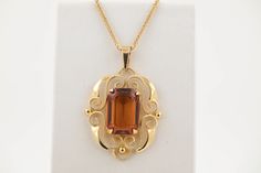 "Crafted in 14ct Yellow Gold  Set with Madeira Citrine  Stone (Vintage)  Size 3.4cm x  1.7cm x 1.2cm  Chain added recently 22\"  Both items have recently  hallmarked at the Assay Edinburgh  Excellent Condition" Antique Gold Citrine Jewelry, Antique Citrine Gold Jewelry, Art Deco Yellow Gold Jewelry For Jewelry Making, Vintage Citrine Yellow Gold Jewelry, Vintage Yellow Gold Citrine Jewelry, Formal Amber Necklace In 14k Gold, Amber Hallmarked Jewelry For Formal Occasions, Formal Gold Jewelry With Bail, Formal Hallmarked Amber Jewelry