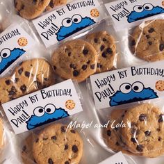 cookie cookies with happy 1st birthday tags on them are in plastic wrappers for sale