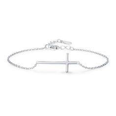 Introducing the MySilverStandard Lucille Cross Bracelet! This beautiful bracelet is crafted from 100% 925 sterling silver, and features a classic cross design. It's perfect for any woman or girl who loves elegant jewelry. The adjustable chain means that it can be worn at any length, making it a versatile piece that can be worn with any outfit. Whether you're dressing up for a special occasion or just wanting to add a touch of class to your everyday look, this bracelet is a must-have. Order yours today! Minimalist Sterling Silver Cross Bracelet, Dainty Sterling Silver Cross Bracelet, Elegant Sterling Silver Cross Rosary Bracelet, Silver Cross Chain Bracelet As Gift, Elegant Adjustable Cross Bracelet, Adjustable White Gold Cross Jewelry, Silver Cross Bracelet With Adjustable Chain, Silver Cross Bracelets With Adjustable Chain, Elegant Sterling Silver Rosary Bracelet