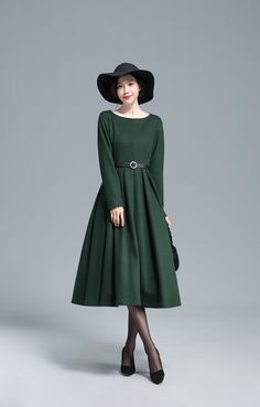 "Stay cozy in this green wool dress from Xiaolizi. The pleated dress made from a super soft wool in a fit and flare construction. The evening dress topped with a boat collar. The winter party dress finished with long sleeves. Details: * More colors https://etsy.me/3Egy6rJ * 35% wool blend, 35% fiber and polyester, 30% nylon * Polyester lining * Two seam pockets * Boat collar * Long sleeves * Regular fit * back zipper * pleated dress * Dry clean * The model is 170cm (5′7″) tall with a 80cm (31.5\ Fall A-line Midi Dress With Pleated Hem, Green A-line Winter Dress, Winter Pleated Long Sleeve Midi Dress, Winter Pleated Dress For Work, Pleated Long Sleeve Midi Dress For Winter, Long Sleeve Pleated Midi Dress For Winter, A-line Midi Dress For Winter, Green A-line Midi Dress For Winter, Green A-line Midi Dress For Fall