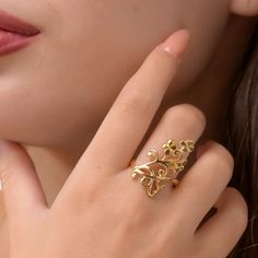 This exquisite 14 Gold Plated Silver floral Ring for Women is a stunning piece that effortlessly combines elegance and sophistication. Crafted with meticulous attention to detail, this ring showcases a beautiful blend of silver and gold, creating a captivating contrast that will instantly catch the eye. The gold adds a touch of luxury and brilliance to the overall design, making it the perfect accessory for any occasion. Designed especially for women, this ring features a sleek and feminine silh Elegant Yellow Gold Flower Ring For Anniversary, Formal Gold Flower Ring Stamped 14k, Luxury Yellow Gold Flower Ring For Anniversary, Elegant Flower Ring For Formal Occasions, Elegant Open Flower Ring For Anniversary, Elegant 14k Gold Jewelry With Intricate Design, Elegant Gold Plated Flower Ring For Wedding, Elegant Filigree Ring For Anniversary, Delicate Hallmarked Ring Jewelry