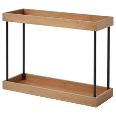 a wooden shelf with black metal legs and a wood tray on the bottom that holds two shelves