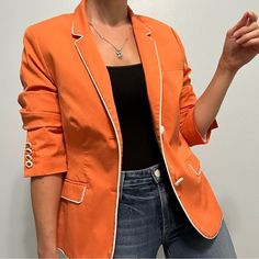 Escada Bright Orange Blazer Jacket Great Pre Owned Condition, No Call Outs Size 40, Us M White Pipping On Buttons And Seams Partially Lined Two Button Closure Hidden Snap Button If More Coverage Is Needed Fitted Fit, It's Oversized On Me For Reference: I Am 5.1 And A Size Xs Tailored Long Sleeve Orange Outerwear, Casual Orange Blazer For Work, Classic Orange Outerwear For Work, Fall Blazer With Contrast Trim And Long Sleeves, Spring Career Long Sleeve Blazer, Formal Orange Outerwear For Spring, Chic Orange Blazer For Spring, Orange Formal Outerwear For Spring, Spring Formal Orange Outerwear