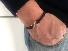 "Infinity  men bracelet, mens gift, minimalist bracelet for boy, for child, for boyfriend, simplistic. Personalized men bracelet Custom colors and sizes bracelet. Magnetic clasp, hypoallergenic. Very fashion and stylish  For other infinity bracelet :  https://www.etsy.com/it/listing/544457603/infinity-men-bracelet-cotton-cord?ref=shop_home_active_2 https://www.etsy.com/it/listing/530607904/inifinity-uomini-braccialetto-bracciale?ref=shop_home_active_3 for other nice solutions take a look to \"gi Black Infinity Bracelet For Friendship, Black Infinity Friendship Bracelet, Black Wristband For Father's Day, Black Everyday Wristband For Father's Day, Minimalist Black Leather Bracelet As Gift, Minimalist Black Leather Bracelet Gift, Simple Black Bracelet For Gift, Simple Black Bracelets As Gift, Simple Black Bracelets For Gift