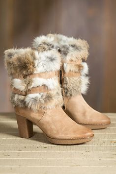 Crafted in fine calfskin suede with a smooth finish, these dress boots flaunt a luxurious rabbit fur shaft with dual buckle strap detail. Free shipping   returns. Fur Trim Outfit, Shoe Makeover, Boot Covers, Waterproof Leather Boots, Warm Winter Boots, Boheme Chic, Hacks Clothes, Sheepskin Slippers, Fur Shoes