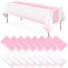 pink and white table cloths with polka dots on them