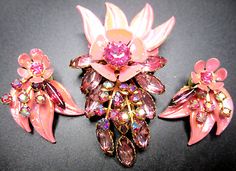 Pink Enamel Flower-shaped Jewelry, Party Jewelry With Jeweled Enamel, Pink Enamel Jewelry For Party, Pink Enamel Jewelry With Matching Earrings, Pink Enamel Party Jewelry, Vintage Enamel Flower Earrings, Vintage Pink Flower Earrings For Party, Vintage Flower-shaped Jewelry With Rhinestones, Vintage Flower Shaped Jewelry With Rhinestones