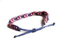 "Join my mailing list for discounts, sales and announcements! Go to: http://eepurl.com/gWZfVH and get an instant 15% discount coupon code. USA flag bracelet made of brazilian wax cord with the colors of the american flag. Wax cord makes this patriotic bracelet very durable. You can even shower or swim with it on and colors barely wash out. Since the USA bracelet is adjustable with a slipknot, it is easily taken on and off. Sizes (adjustable through a slipknot): - S - 13 cm (5.1''). The bracelet Patriotic Red Friendship Bracelet As Gift, White Bracelets For Independence Day Gift, Independence Day White Bracelets Gift, Blue Patriotic Bracelet For Friendship, Patriotic Bracelets For 4th Of July Gift, Patriotic Blue Friendship Bracelets As Gift, Patriotic Blue Friendship Bracelets, Patriotic White Friendship Bracelets As Gift, Blue Friendship Bracelets For 4th Of July Gift