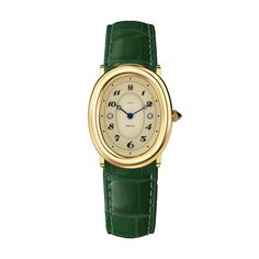 This vintage-inspired timepiece features a creamy latte dial with graceful numerals, mysterious deep blue hands, and an elegant textured strap. The golden steel case beautifully complements the deep green strap, showcasing timeless elegance that withstands the test of time. Case: 24mm steel case with polished and satin Vintage Eisenhart Jewelry, Luxury Art Deco Jewelry And Watches For Gifts, Luxury Vintage Engraved Jewelry And Watches, Luxury Antique Watch Accessories For Formal Occasion, Luxury Vintage Watch Bracelet Strap, Luxury Vintage Watches For Formal Occasions, Products To Buy, Green Things, Green Stuff