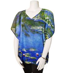 a mannequin wearing a blue top with water lilies on it