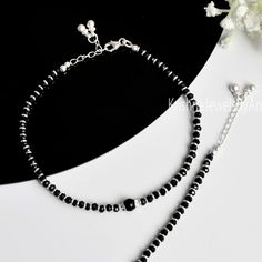 We offer only the finest silver jewelry in our collection. Material - Pure 92.5 Solid Sterling Silver Stone - Synthetic Black Beads Purity - 100 % Genuine 925 Silver Length - 10 Inches + 1 Inch Extension   Weight -   8 Gm Approx  (Approx. Weight For Single Anklet)                   16 Gm Approx (Approx. Weight For Pair Anklet) Free Standard Shipping Worldwide Payment Policy :- We accept payment through PayPal. All payments must be made within 7 days of purchase. If you are experiencing some difficulty in paying through PayPal and need additional time, please  contact us. Shipping Policy :- All United States parcel will be shipped through USPS Shipping Service within 1-3 business days after received payment. (It takes 2 to 3 weeks to get it delivered) All Countries (Except USA) parcel will Black Moti Payal Design, Protection Anklet, Anklets Black, Feet Bracelet, Black Anklet, Black Metal Jewelry, Beads Anklet, Silver Anklets Designs, Kids Gold Jewelry