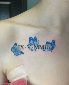 a woman's chest with butterflies and the words xx v mmm on it