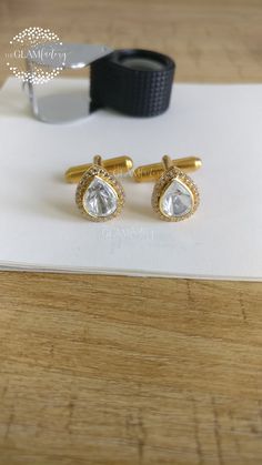 Beautiful Diamond Slice/Polki Cufflinks pair for Men and Boys, Matte finish, made using guaranteed silver 925 as base metal and real 18K gold filled which is very durable and will stay for years. Both slice and rounds are Cubic Zirconia, we have used best 5A quality of cubic zirconia which looks exactly like real diamonds Slice Cut is 8 mm x 10 mm Rounds 1.25 mm Gold Filling is completely different from Gold Plating as gold filling contains 100% gold which does not go away easily and enhances th Tie Tack, Tie Accessories, Cuff Links, Real Diamonds, Base Metal, Gold Plating, Silver 925, Gold Filled, Cufflinks