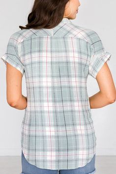 Plaid, but make it sunny! The Grace & Lace Short Sleeve Favorite Plaid is the warm weather version of your Favorite Button Up Plaid, perfect for embracing warmer days! Ultra soft and lightweight, this button up mint plaid top features the same stretchy fabric blend as the long sleeved version, for all-day comfort that flatters your shape. The mandarin collar, short sleeves and trendy soft color palette keeps this plaid fresh for any season. Style buttoned up or as a layer over tanks paired with your favorite light denim washes for an easy, everyday look! Casual plaid button-up top with short dolman sleeves. Fabric is woven with some stretch. Fit is true to size, stay in your normal size. If between sizes, size up for a more relaxed fit. * These are not an oversized design like the Favorite Spring Plaid Tops For Everyday, Everyday Plaid Tops For Spring, Plaid Tops For Everyday Spring Wear, Casual Plaid Tops For Daywear, Everyday Plaid Summer Tops, Plaid Tops For Everyday Summer Wear, Plaid Tops With Button Closure For Day Out, Everyday Gingham Tops For Spring, Casual Gingham Top With Button Closure