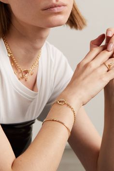 Founders Sidney Neuhaus and Jessica Warch both come from families in the diamond trade, so reverence for them is at the heart of Kimaï's designs. Made from 18-karat gold, this 'Atlas' bracelet has a finely linked chain that's interrupted by a carabiner clasp dusted with diamonds. It's the perfect gift for a loved one. Polished Yellow Gold Diamond Bracelet, Yellow Gold Diamond Bracelet With Polished Finish, Timeless Gold Bracelets With Single Cut Diamonds, Heirloom Yellow Gold Bracelet With Diamond Accents, Heirloom Yellow Gold Bracelet, Everyday Luxury Yellow Gold Bracelet With Diamond Accents, Fine Jewelry Chain Bracelet With Single Cut Diamonds, Timeless Yellow Gold Bracelet With Diamond Accents, Yellow Gold Bracelets With Single Cut Diamonds