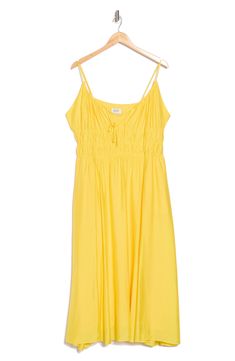 Perfect to dress up or down, this matte satin sundress features a dainty tie keyhole and shirred waist that relaxes into a flowy silhouette. 45" length (size 1X) Slips on over head Scoop neck with ties Adjustable straps Side-seam pockets 85% viscose, 15% silk Dry clean Imported Satin Sundress, Empire Yellow, Midi Sundress, Matte Satin, Sundress, Nordstrom Rack, Scoop Neck, Adjustable Straps, Dress Up