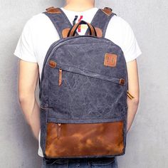 This Men's Backpacks Canvas Backpack Schoolbag is the perfect choice for carrying your laptop and other everyday items. Made from high-quality cotton canvas, it features adjustable straps, and plenty of room for your laptop, books, and other items. It is stylish and durable, making it a great choice for any occasion. It also features a 14-inch laptop compartment for added convenience. Enjoy the convenience of this stylish and practical backpack.  ITEM DETAILS  Item Type: Backpacks 
Lining Material: Polyester 
Interior: Computer Interlayer,Interior Zipper Pocket,Interior Slot Pocket,Cell Phone Pocket 
Closure Type: Zipper 
Main Material: Canvas 
Style: Casual 
Style: Fashion men's backpacks 
Features: Casual rucksacks 
Size: 18.11 x 11.81 x 5.12 inches/ 46 x 30 x 13 cm, fit 14 inches lapto Cotton Canvas Backpack With Canvas Lining, Cotton Canvas Backpack With Adjustable Strap, Large Capacity Cotton Backpack For Everyday Use, Large Capacity Cotton Backpack For Back To School, Cotton Canvas Bag With Adjustable Strap, Functional Cotton Canvas School Bag, Back To School Large Capacity Cotton Backpack, Cotton Canvas Backpack For Everyday Use, Casual Backpack With Laptop Sleeve For Daily Use