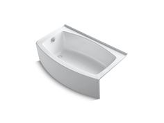 a white bath tub sitting on top of a white floor