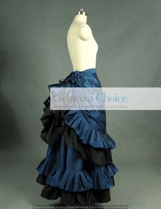 Pleated gathered high quality taffeta bustle skirt with dramatically cascading tiers Beautiful design with ribbon drawstring at back to form to waist Ribbon drawstrings on top tiers to cinch skirt into a gathered bustle at back This skirt needs no hoop or petticoat underneath it Pair skirt with a gorgeous blouse /or jacket to achieve the most breathtaking outfit popular in the 1880s 41 inches (104 cm) from waist to hem Follow us on our Instagram @VictorianChoice The best way to tell which size f Edwardian Skirt Pattern, Cinch Skirt, Navy Coat Women, Witch Skirt, Skirt Halloween Costume, Edwardian Skirt, Punk Costume, Walking Skirt, Tudor Dress