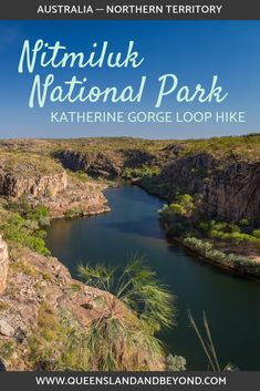 a river surrounded by mountains and trees with the words hiking in the top end national park