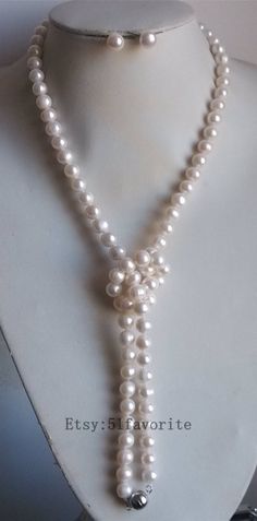 Jewelry: fresh water pear, genuine cultured pearl Color: white Grade: AA+, have natural blemish and thread as photos, photos taken in kind Size: 9-10mm Length: offer 16,17,18,19,20, 33, 48, 64, 80, 96 inch, photos shows is 33 inch! 48 inch, 64 inch, 80 inch and 96 inch can finish without clasp. If you need clasp. Please contact me. Other length please contact me. Handwork: knotted between every 2 pearl bead Metal: alloy Shipping: I will send out your order in 1-2 business days. Usually will take Classic White Pear-shaped Jewelry, Classic Pear-shaped White Jewelry, Elegant Pear-shaped Pearl Necklace Gift, White Pear-shaped Akoya Pearl Necklace, Pearl White Akoya Pearl Drop Jewelry, White Drop Pearl Necklace As Gift, White Drop Pearl Necklace Gift, White Drop Pearl Necklace For Gift, Elegant Drop Pearl Necklace For Anniversary