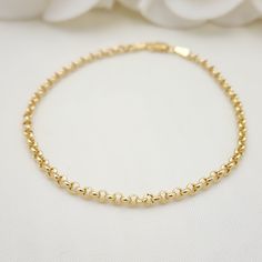 Beautiful real 14k Gold Rolo Bracelet. Perfect for everyday and every ocassion. Modern, versatile and everlasting. 14k gold will not tarnish or rust. Great gift idea. Materials: 14k Gold Lenght: 7.5 Inches Thickness: 3mm Weight: 1.6 grams (Hollow) 14k stamped Brand new Fast shipping Briza Collections is a small family owned business that works hard on providing the best selection of Fine Solid Gold Jewelry for the best prices. Our Goal is to bring you happiness and satisfaction, for this reason Everyday Flexible Round Gold Bracelet, 14k Yellow Gold Filled Jubilee Charm Bracelet, Hypoallergenic 14k Gold-filled Yellow Gold Bracelet, Hypoallergenic 14k Yellow Gold Chain Bracelet, Elegant Jewelry With Rolo Chain And Round Beads, Hypoallergenic 14k Yellow Gold Bracelets, Gold Hypoallergenic Bracelet, Hypoallergenic 14k Gold Round Bracelet, Classic Gold Bracelets With Rolo Chain