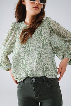 Subcategory: Blouse. Neck: Crew neckline. Sleeves: Long Sleeves. Print: Floral print. Fit: Relaxed fit. Style: Boho. Fabric: Chiffon. Zipper: Button placket. runs true to size. S. 100% Polyester Green Paisley Print Long Sleeve Tops, Green Long Sleeve Tops With Paisley Print, Bohemian Puff Sleeve Printed Top, Bohemian Puff Sleeve Top With Print, Green Long Sleeve Blouse With Paisley Print, Chic Long Sleeve Top With All Over Print, Green V-neck Tops With Blouson Sleeves, Green Blouse With Blouson Sleeves, Green Long Sleeve Tops With Printed Motifs