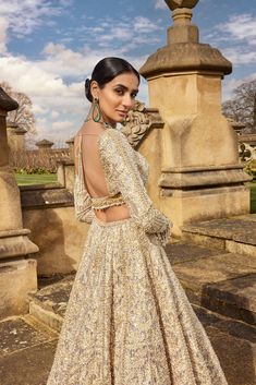 This lehenga set features all-over rose gold metallic work with crystal, pearl, and sequin. The ensemble is paired with a full-sleeved blouse and shows tassels at the wrist and blouse waist and a matching net dupatta.From Seema Gujral's A Royal Affair collection. DELIVERY TIMEPlease allow 8-12 weeks for your outfit to arrive. FABRIC DETAILSNet Professional cleaning only. Rose Gold Lehenga, Gold Lehenga, A Royal Affair, Metallic Rose Gold, Net Dupatta, Desi Fashion, 12 Weeks, Professional Cleaning, Skirt Length