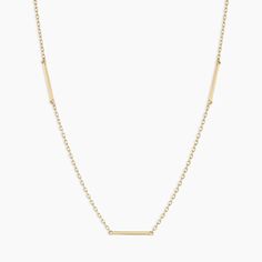 Because solid gold will always be in style. This classic gold necklace is a foundational piece for your layer. Love the timeless appeal of a solid gold necklace layer? Style your 14k Gold Rose Bar Necklace with the 14k Gold Parker Chain Necklace. Product Details 14k solid gold 15" chain + 2" extender. Adjustable in 1 inch increments 15" - 17" Bar charm measure 10 mm by 0.9 mm Spring ring closure | Rose Bar Necklace, Women's by gorjana Classic Yellow Gold Station Necklace With Clavicle Chain, Yellow Gold 14k Minimalist Station Necklace, Elegant Bar Necklace With Cable Chain, Everyday 14k Gold Bar Necklace With Adjustable Chain, Modern 14k Gold Necklaces For Layering, Minimalist 14k Yellow Gold Station Necklace, Minimalist 14k Gold Station Necklace, Classic 14k Gold Chain Necklace For Layering, Elegant Everyday Bar Necklace With Cable Chain