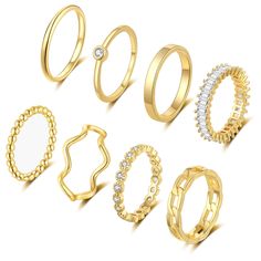 six different types of gold rings with diamonds