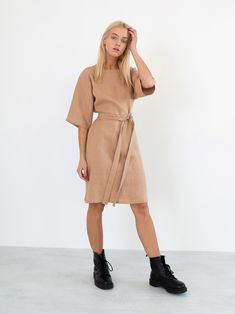 "ISABEL is a linen kimono sleeve dress. DETAILS - Dolman style sleeves - Above the knee length - Self tie belt - 100% lightweight European linen fabric - Cut and sewn to order just for you in our studio COLOR - Camel, you can also choose other colors above - Fabric samples are available here https://www.etsy.com/listing/586569696/linen-fabric-samples SIZING & FIT - Relaxed fit - Length is approximately 38.5 inches / 98 cm - Bust is approximately 21 inches / 53 cm - Hips are approximately 43 Short Sleeve Linen Midi Dress For Fall, Beige Linen Midi Dress For Work, Beige Linen Dress For Workwear, Beige Linen Dress For Work, Knee-length Linen Dress For Workwear In Fall, Beige Linen Dresses For Work, Fall Linen Dress For Work, Beige Knee-length Linen Dress For Work, Fall Workwear Linen Dress