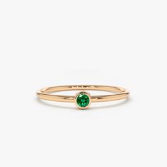 Item Details

Made to Order
Gold KT: 14k Solid Gold
Round Emerald: 2.5MM
 Number of Stones: 1
 Total CTW: 0.08ctw
 Width of Band: 1.20mm
 Setting Type: Bezel

 
 Description 
The dazzling solitaire emerald is set on a dainty solid gold ring band. Give your loved one a gift that’s perfect for her. Gold Ring Band, Solid Gold Band, Jewels Rings, Solid Gold Ring, Hot Jewelry, Local Jewelry, Gold Band Ring, Handcrafted Rings, Solid Gold Rings