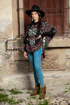 This gorgeous Mexican Artisanal Poncho is perfect for the cold months ahead! The multicolor Fair Isle design adds that perfect pop of color and style to your wardrobe. This poncho is knit, has open sides and it comes in one size so anyone ranging from size Small to 2x will be able to wear it. Note: -The Mexican Hat, Filigree Earrings and Boots are available to buy as well. Filigree Earrings: https://www.etsy.com/es/listing/702840317/filigrana-de-plata-filigrana-clasica?ref=listings_manager_grid Mexican Winter Outfit, Black Bohemian Poncho With Batwing Sleeves, White Festival Poncho, Long Sleeve Poncho For Winter Festivals, Winter Long Sleeve Festival Cape, One-size Winter Festival Cape, Multicolor Bohemian Acrylic Outerwear, Winter Festival One-size Cape, Multicolor Casual Shawl Poncho