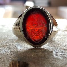 Made to order - 925 sterling silver or 10K - 14K - 18K Solid Gold, signet ring engraved with your university's logo, family crest or any image you request. There is no extra cost for side engravings. ✔Ring Details Ring stone 16mm Metal: 10K Gold, 14K, 18K Gold or 925 Sterling SILVER Please send us a sample image you would like engraved after placing an order. ✈️ Shipping Policy FREE EXPRESS SHIPPING to USA and EU. We use Fedex, TNT, UPS for express shipping. For shipping services, you will be provided with a tracking number. ➡️After the full payment is received, the product will be shipped within 5-7 business days. Fast shipping is delivered within approximately 1-4 business days. 📯 Import duties, taxes and charges are not included in the item price or shipping charges. Customs or charges Classic Carnelian Signet Ring For Anniversary, Classic Carnelian Rings With Polished Finish, Classic Carnelian Signet Ring For Formal Events, Classic Carnelian Signet Ring For Formal Occasions, Classic Carnelian Signet Ring With Polished Finish, Classic Carnelian Round Signet Ring, Classic Round Carnelian Signet Ring, Formal Carnelian Oval Signet Ring, Formal Carnelian Signet Ring With Polished Finish