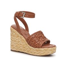 Marc Fisher-Gladi Wedge Sandal Strap into the Gladi sandals from Marc Fisher. The intricate openweave upper and bold wedge heel will elevate casual warm weather looks, or put the perfect finishing touch on more formal ensembles. Trending Handbags, Brown Accessories, Fab Shoes, Womens Summer Shoes, Shoe Inspo, Trending Sneakers, Marc Fisher, Brown Sandals, Sneaker Brands