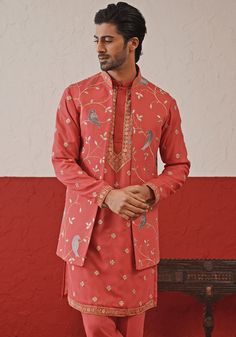 Radiate warmth in stunning Red Embroidered Jacket Kurta. Crafted from luxurious georgette, the front open jacket features resham and sequinned embroidery work. Teamed with a yoke design kurta adorned with all-over motifs. Completed with matching trousers and pure lining for ultimate comfort. Perfect for Sangeet, Mehendi, or as a wedding guest outfit. Composition : Jacket, Kurta & Trouser : Viscose Georgette Care: Dry Clean Only and Vacuum Storage This product can be customized for sleeves, length and colour Delivery : 4-6 weeks as the product is hand crafted. Check Size Guide or choose MySize for free customisation (All Sizes above XL can be made at 15% additional cost) For more information and sizes please contact fabiliciousfashion@gmail.com or visit our Copenhagen studio. About the Desi Bollywood Style Outerwear With Zari Work For Festive Season, Elegant Embroidered Outerwear For Diwali, Festive Outerwear With Intricate Embroidery For Diwali, Festive Outerwear With Intricate Embroidery, Bollywood Style Outerwear With Chikankari Embroidery, Bollywood Style Outerwear With Resham Embroidery, Festive Bollywood Outerwear With Chikankari Embroidery, Bollywood Style Outerwear For Eid Reception, Traditional Festive Outerwear For Reception