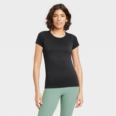 Women's Seamless Short Sleeve Shirt - All In Motion™ Solid Compressive Athleisure T-shirt, Basic High Stretch Activewear With Crew Neck, Basic High Stretch Crew Neck Activewear, Compressive Solid T-shirt For Sports, Athleisure Snug Fit Crew Neck T-shirt, Snug Fit Crew Neck Athleisure T-shirt, Snug Fit Crew Neck T-shirt Athleisure, Breathable Stretch T-shirt, Breathable Solid Stretch T-shirt