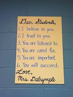 a handwritten note with the words dear students, i believe in you