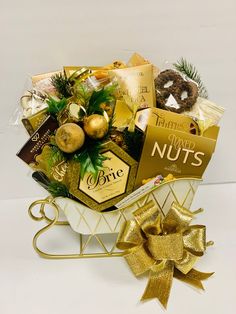 a christmas gift basket with nuts and chocolates