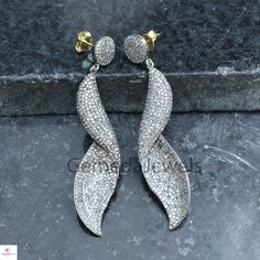 Sale!! Pave Diamond Earrings, Twisted Earrings Jewelry, 14k Gold Earrings, 925 Silver Diamond Earrings, Valentine Gift Jewelry, Gift For her Earrings Details: Gold Weight: 0.35 gm Diamond Weight: 6.75 Cts Gross Weight: 15 Grams Earrings Size: 68X13mm 14 k Yellow Gold Earring NOTE:- All The Products Are Designed And Manufactured In My Workshop By Me & My Team. Shown Products Are Purely Handmade. Custom Orders Are Open Handly Accepted. We Are Perfect Choice For Any Custom Jewelry Manufacturing Sterling Silver Pave Setting Earrings For Anniversary, Sterling Silver Earrings With Pave Setting For Anniversary, Anniversary Sterling Silver Earrings With Pave Setting, Sterling Silver Earrings With Pave Setting As A Gift, Sterling Silver Pave Bridal Earrings As Gift, Dazzling Sterling Silver Bridal Earrings With Pave Setting, Pave Set Teardrop Earrings For Gifts, Sterling Silver Fine Jewelry Earrings With Pave Setting, Teardrop Pave Set Earrings Gift