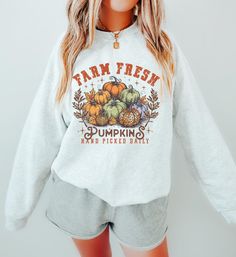 Pumpkin Shirt, Fall Sweater, Pumpkin Patch Sweatshirt Made using 100% ethically grown US cotton.  .: Fabric blends: Heather Sport colors - 60% polyester, 40% cotton ✿ Processing Time ✿ ⏰ Our processing time is 1-3 days. During holidays, please expect slight delays due to increased orders, but we'll do our best to get your order to you ASAP! ✿ Returns ✿ All items are made to order. Because they're personalized, we can't accept returns unless the item arrives damaged or defective. If you have any Fall Cotton Sweater With Screen Print, Fall Cotton T-shirt, Relaxed Fit Sweatshirt With Screen Print For Fall, Relaxed Fit Sweater With Screen Print For Fall, Fall Graphic Tee Sweatshirt With Relaxed Fit, Fall Crewneck Sweatshirt, Fall Crewneck, Patch Sweatshirt, Fresh Pumpkin