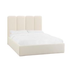 the headboard and foot board of a bed with white linens on top of it