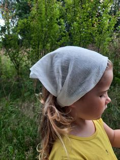 🎁Description. Linen summer headband with elastic in the back. Headband is cover head from the sun and it is comfortable to wear it all day along, because linen is breathable. Perfect for garden, beach & everyday. 🎁 Composition. 100% softened Europian linen.  🎁Size. *For girls 3+ years & over, fits head 50-54cm because of the elastic in the back. * For woman, fits head 54-58cm because of elastic in the back. 🎁Color. Milk white, but we have more colors. Please check the listing gallery. 🎁Care. You can keep the headband clean very easy, just wash it in the washing machine 🎁 Order procesing. Your order will be made for you in max 1 week & after will be shipped to you. Adjustable Headwrap For Summer Beach, Adjustable Headwrap For Beach In Summer, Adjustable Beach Headwrap For Summer, Adjustable Summer Beach Headwrap, Summer Beach Headwrap, White Headwrap For Beach In Spring, Summer Cotton Bandana Gift, Bohemian White Headband For Spring, White Bohemian Headband For Spring