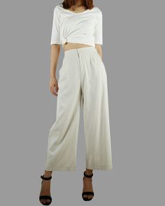 * A wide leg cropped linen pants, with cropped length, two pockets, fixed waist on front and elastic waist on back. * Material: 50% linen, 50% cotton Custom made to fit, lead time is 6-8 days; Let us know your usual size in your country and your overall height. If you have some specific request or special characters such as broad shoulder, long arms, long waist, etc you think we need pay attention to when making, do let me know. * Colors: 1. Beige 2. White 3. Black 4. Khaki 5. Coffee * Shop sizi Casual Cropped Wide Leg Pants With Pockets, White Linen Wide Leg Harem Pants, Versatile Cropped Bottoms For Day Out, Cotton Wide Leg Pants For Day Out, Cropped Wide Leg Pants For Spring, Spring Cropped Bottoms With Loosely Fitted Hips, Beige Cropped Cotton Bottoms, White Cotton Wide Leg Culottes, Versatile Cropped Pants With Relaxed Fit